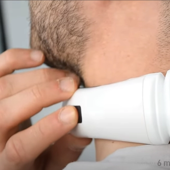guy tapping on button Med Neck Massager